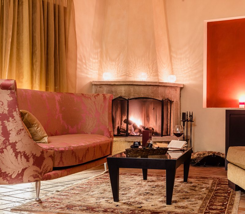 Cosmos Superior Suite sitting area with fireplace