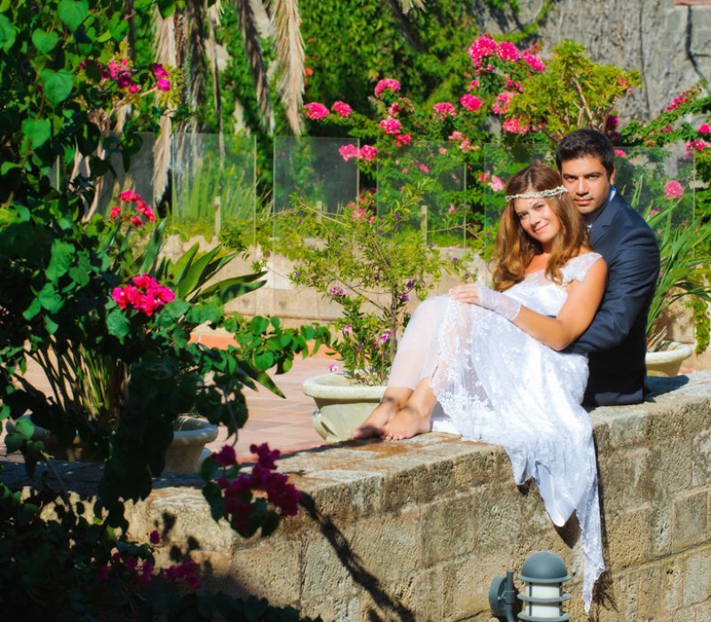 Wedding couple in the courtyard of Avalon Boutique Suites Hotel